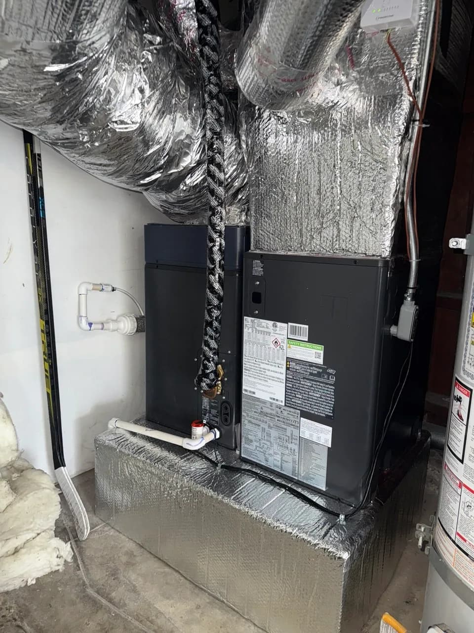 Air handler installed in a narrow basement mechanical space