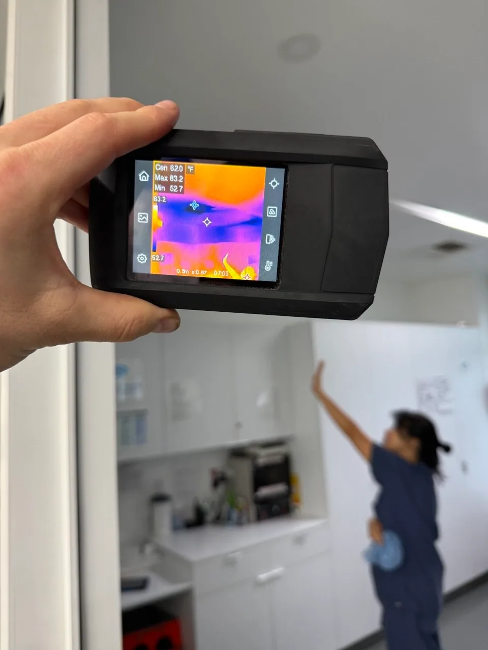 Thermal camera showing the heat signature of a wall during diagnostics